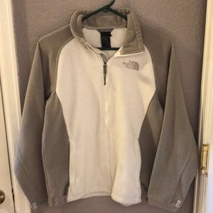 White and gray Northface zip up